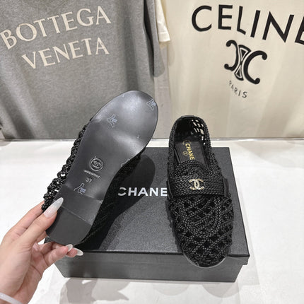 CHANEL 26S BRAIDED MULE IN BLACK WOVEN LEATHER