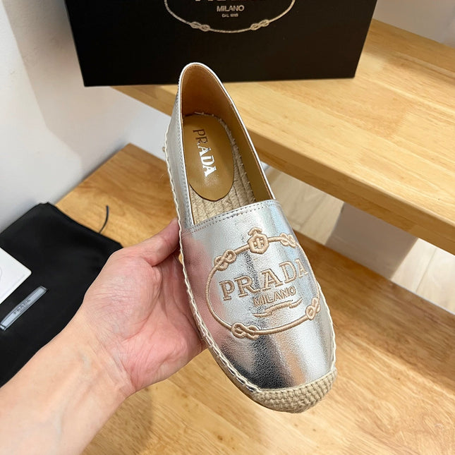 PRADA 26S EMBROIDERED LOGO ESPADRILLE FLATS IN SILVER CALFSKIN