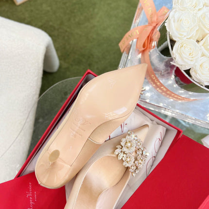 EFFLORESCENCE POINTED-TOE PUMPS IN NUDE SATIN WITH CRYSTAL BUCKLE
