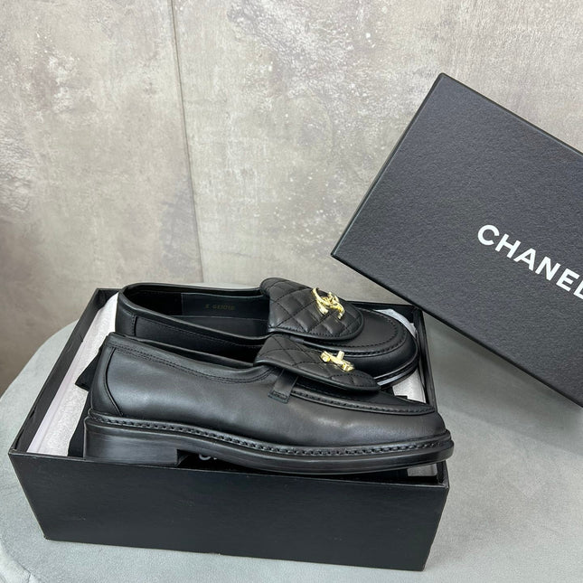 CHANEL 26S LOAFERS IN BLACK QUILTED CALFSKIN WITH CC LOGO