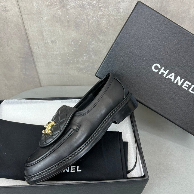 CHANEL 26S LOAFERS IN BLACK QUILTED CALFSKIN WITH CC LOGO