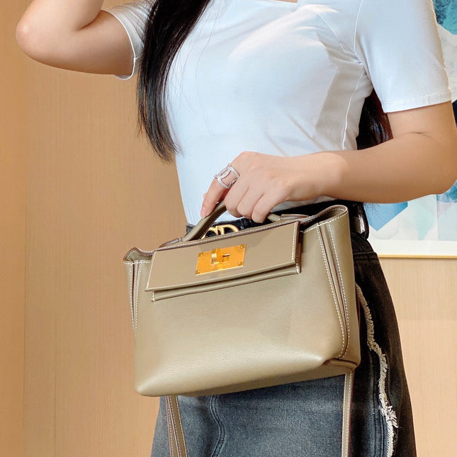 MINI 24/24 21CM IN TOGO ETOUPE EVERCOLOR CALFSKIN GOLD KELLY BUCKLE