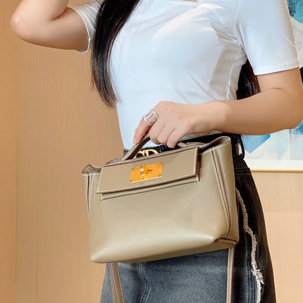 MINI 24/24 21CM IN TOGO ETOUPE EVERCOLOR CALFSKIN GOLD KELLY BUCKLE