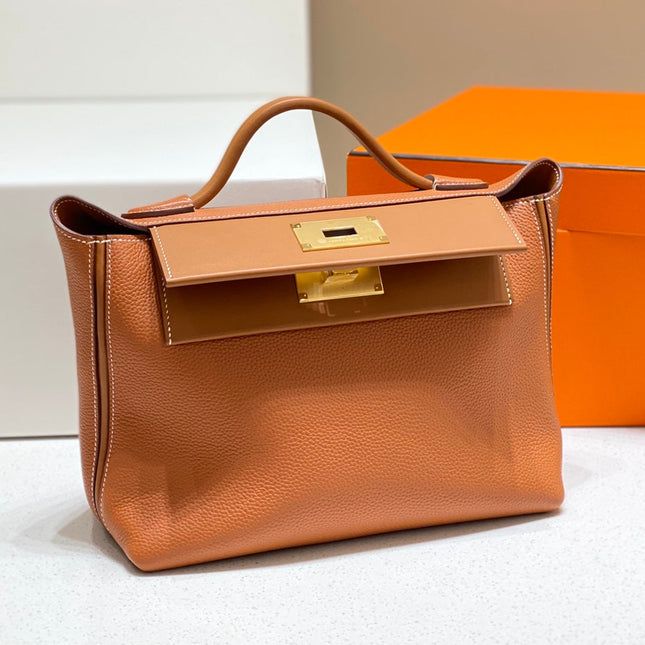 HM 26S 24/24 29MM IN ORANGE EVERCOLOR CALFSKIN GOLD KELLY BUCKLE
