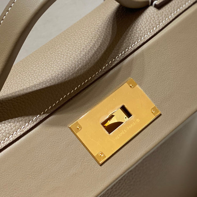 HM 26S 24/24 29MM IN BROWN EVERCOLOR CALFSKIN GOLD KELLY BUCKLE