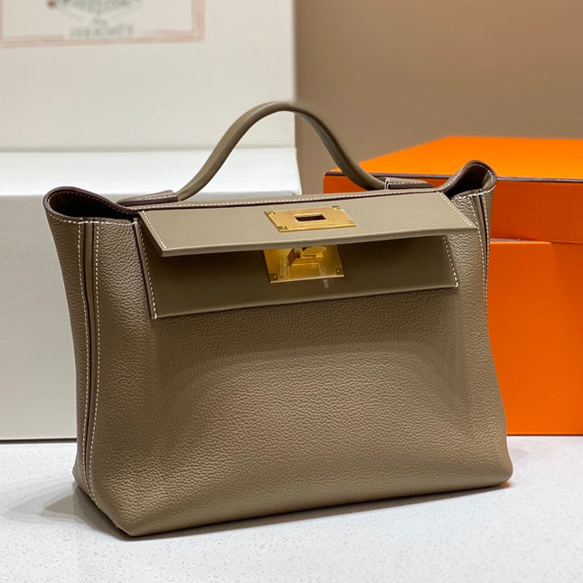 HM 26S 24/24 29CM IN BROWN EVERCOLOR CALFSKIN GOLD KELLY BUCKLE