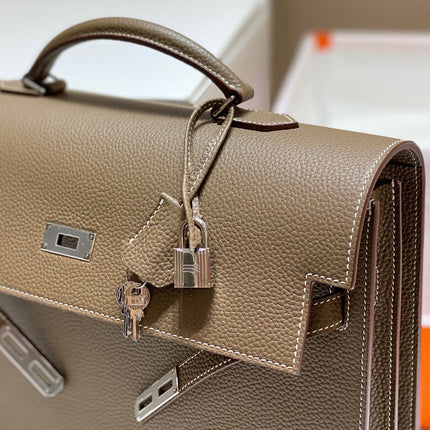 KELLY DEPECHES 34 BRIEFCASE IN ETOUPE TOGO CALFSKIN SILVER HARDWARE