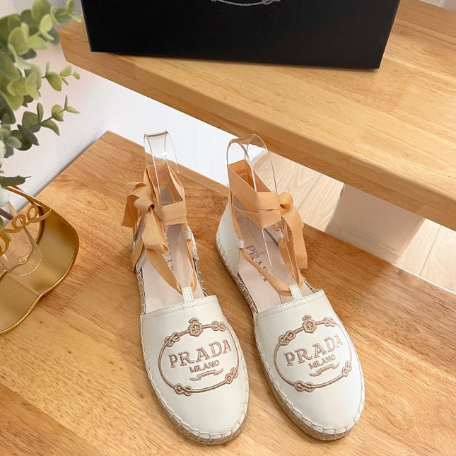 PRADA 26S LACE UP ESPADRILLE FLATS IN CREAM WHITE CALFSKIN