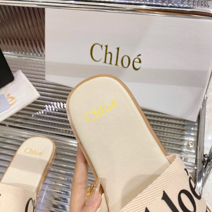 WOODY SLIPPER IN BEIGE MIX BLACK CANVAS