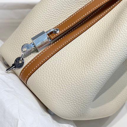 HERMES 25S PICOTIN LOCK 18 IN BURNT ORANGE AND IVORY CALFSKIN SILVER HARDWARE