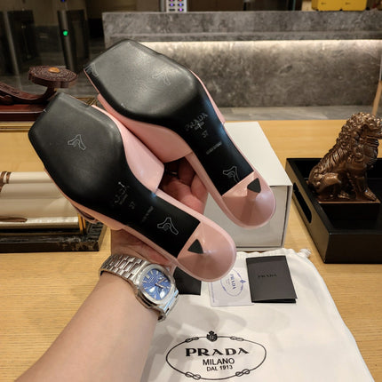 PRADA 26S OPEN TOE MULES 45MM IN BLUSH PINK PATENT CALFSKIN WITH ROSETTE