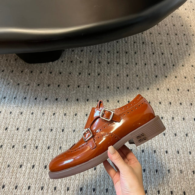 MIUMIU 26S CHURCH BROGUE MONK STRAP SHOES IN RUST ORANGE PATENT CALFSKIN