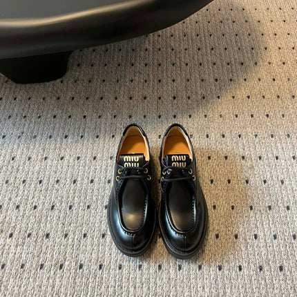 MIUMIU 26S LACED FUME SHOES IN BLACK GLOSSY CALFSKIN
