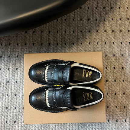 MIUMIU 26S FRINGE BUCKLE LOAFERS IN BLACK CALFSKIN