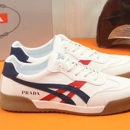PRA SNEAKER IN WHITE CALFSKIN WITH NAVY BLUE AND RED STRIPED