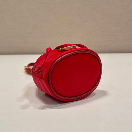 MINI BUCKET BAG 10 IN RED RE-NYLON AND SAFFIANO LEATHER STRAP