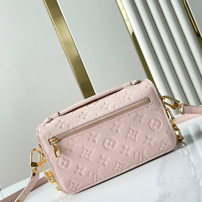 POCHETTE MÉTIS EAST WEST 21 IN PINK OPALE MONOGRAM ECLIPSE CANVAS GOLD BUCKLE