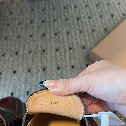 MIUMIU 26S PENNY LOAFERS IN BURGUNDY BROWN SHINY CALFSKIN