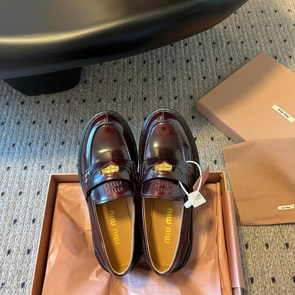 MIUMIU 26S PENNY LOAFERS IN BURGUNDY BROWN SHINY CALFSKIN