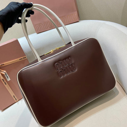 MIUMIU 26S BEAU BAG 34 IN DARK BROWN AND WHITE CALFSKIN