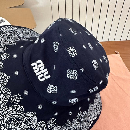 MIUMIU BUCKET IN BLACK FABRIC WITH EMBROIDERED PATTERN