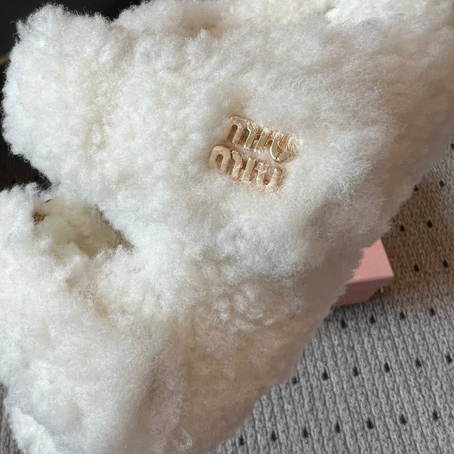 MIUMIU 26S SHEEPSKIN SLIPPERS IN WHITE