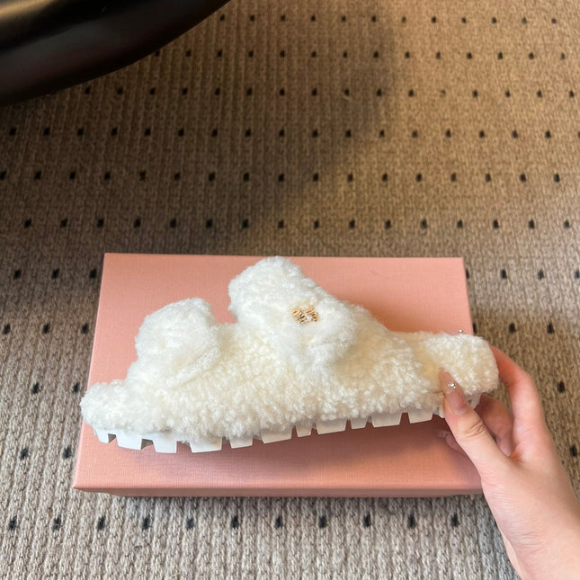 MIUMIU 26S SHEEPSKIN SLIPPERS IN WHITE