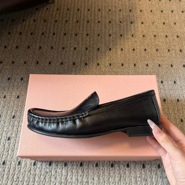 MIUMIU 26S LOAFERS IN BLACK CALFSKIN