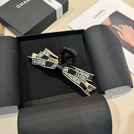 DIOR 26S BOW HAIR CLIP IN BLACK ACETATA 500564