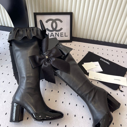 CHANEL BOW HIGH BOOTS IN BLACK CALFSKIN