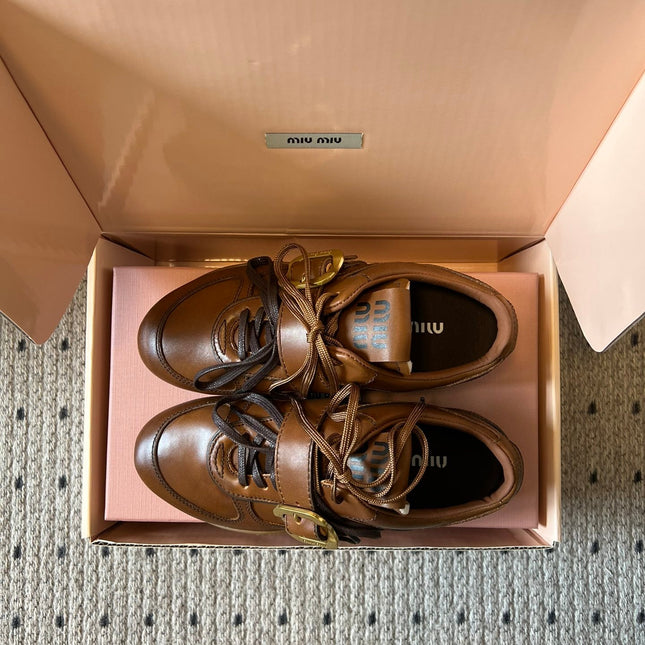 MIUMIU 26S GYMNASIUM SNEAKER IN COGNAC BROWN CALFSKIN WITH GOLD BUCKLED STRAP