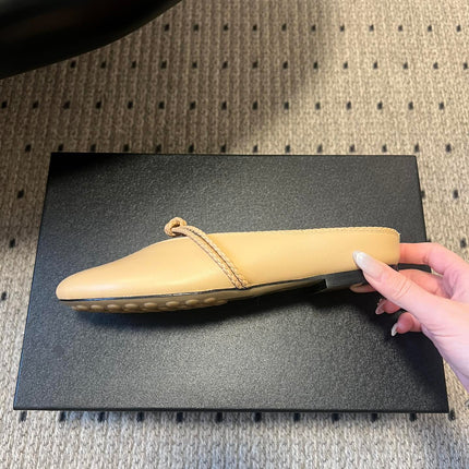 BOTTEGA VENETA 26S FLAT MULES IN BEIGE LAMBSKIN