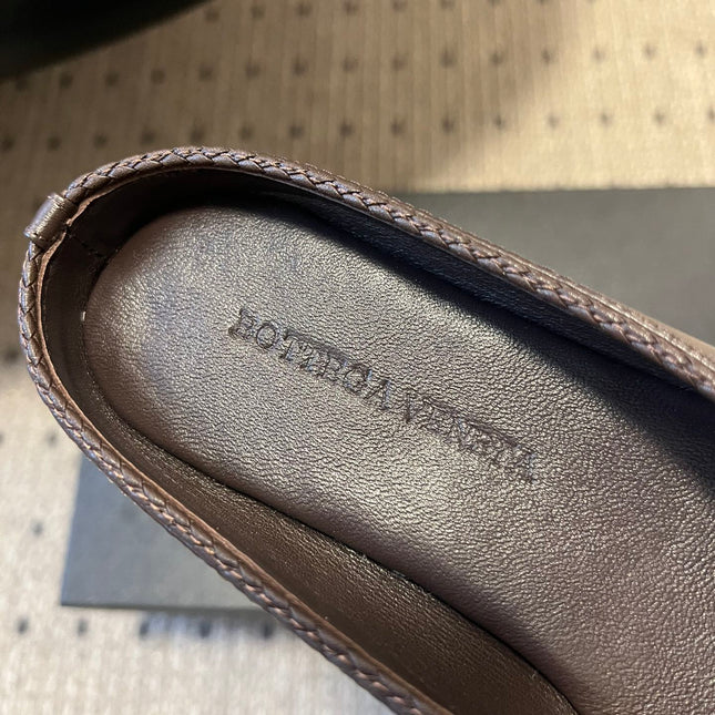 BOTTEGA VENETA 26S FLAT MULES IN DARK BROWN LAMBSKIN