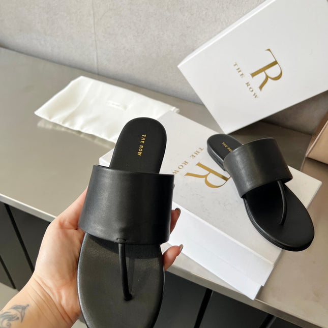 THE ROW 26S FLAT THONG SANDALS IN BLACK CALFSKIN