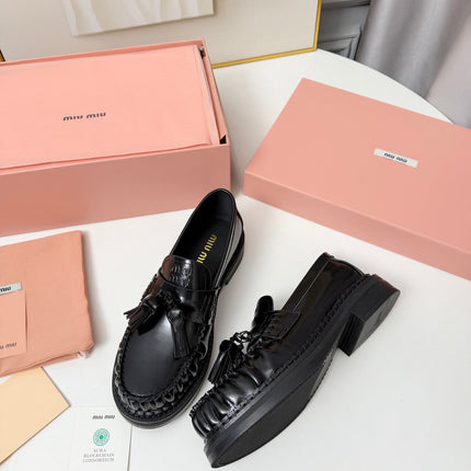 MIUMIU 26S TASSEL LOAFERS IN BLACK CALFSKIN