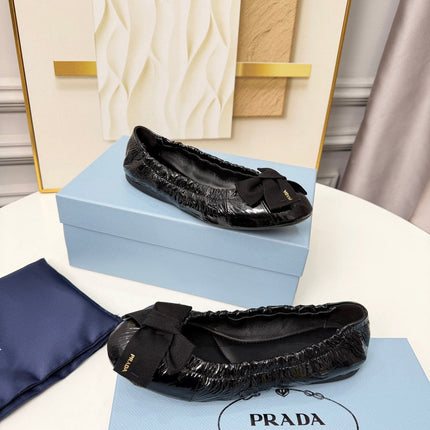 PRADA 26S BALLERINA FLATS IN BLACK CALFSKIN WITH BOW