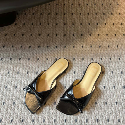 DIOR 26S OBLIQUE BOW MULE IN BLACK CALFSKIN