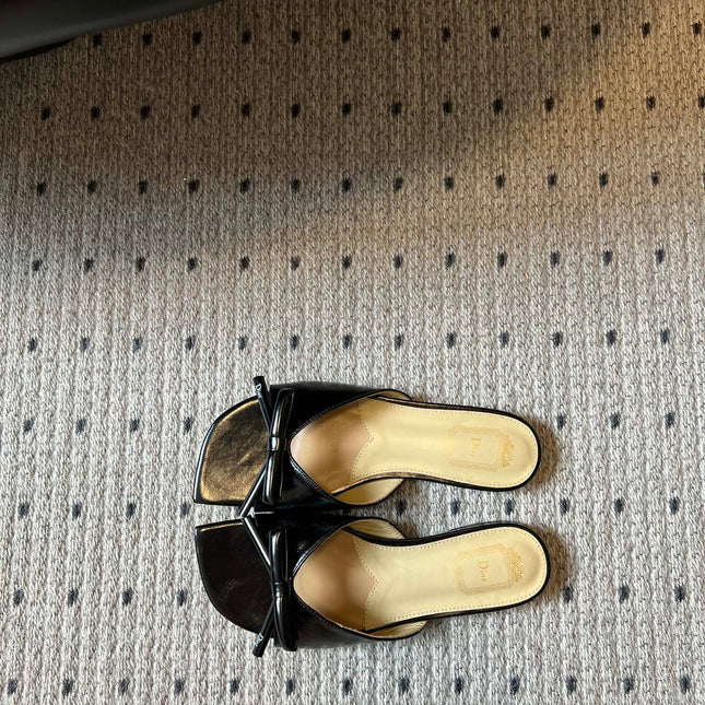 DIOR 26S OBLIQUE BOW MULE IN BLACK CALFSKIN
