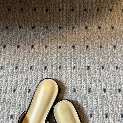 DIOR 26S OBLIQUE BOW MULE IN BLACK CALFSKIN