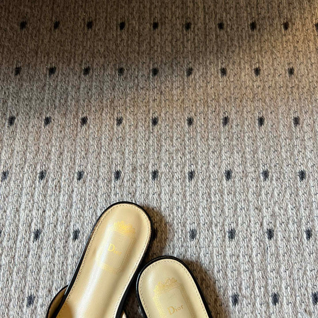 DIOR 26S OBLIQUE BOW MULE IN BLACK CALFSKIN