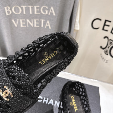CHANEL 26S BRAIDED MULE IN BLACK WOVEN LEATHER