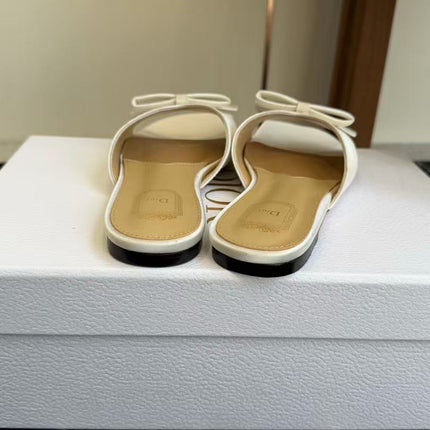 DIOR 26S BOW FLAT MULE IN CREAM LAMBSKIN