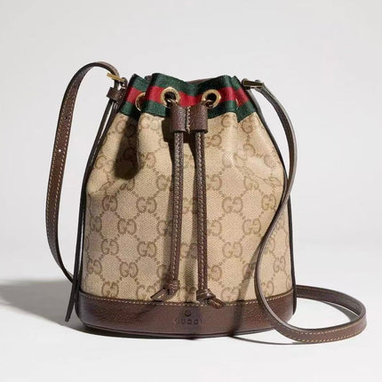 GUCCI BUCKET BAG 26S IN BEIGE GG SUPREME CANVAS AND DARK BROWN CALFSKIN
