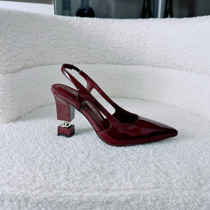 CHANEL 26S METIERS D'ART SLINGBACK PUMP IN BURGUNDY PATENT CALFSKIN CUT-OUT CC LOGO HEEL