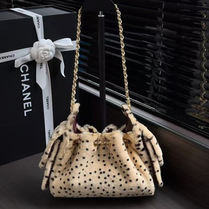 CHANEL 26S DRAWSTRING SHOULDER BAG IN LEOPARD PRINT FAUX FUR