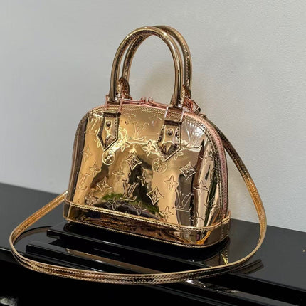SPEEDY 23 IN GOLD MONOGRAM EMBOSSED CALFSKIN