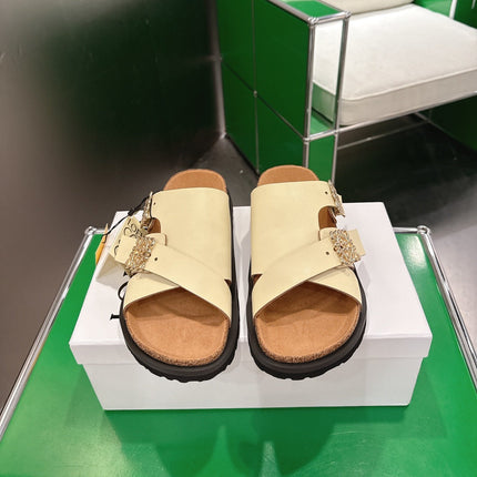 LOEWE 26S ANAGRAM FLAT SLIDES IN BEIGE CALFSKIN