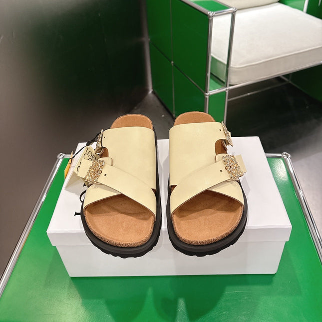 LOEWE 26S ANAGRAM FLAT SLIDES IN BEIGE CALFSKIN