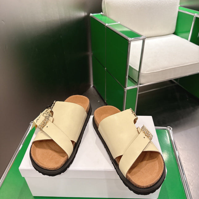 LOEWE 26S ANAGRAM FLAT SLIDES IN BEIGE CALFSKIN