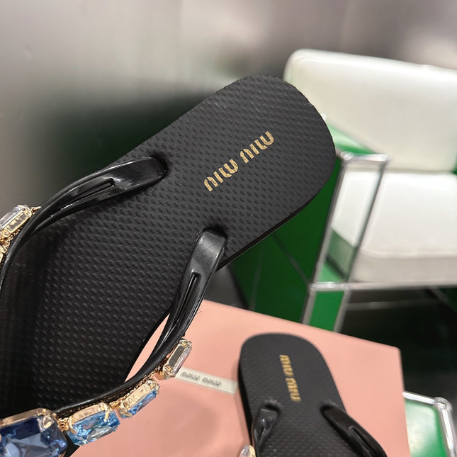 MIUMIU 26S THONG SANDALS IN BLACK EVA BLUE CRYSTAL-EMBELLISHED